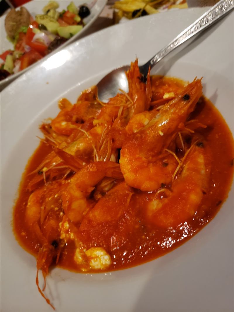 Shrimp saganaki in rich red sauce