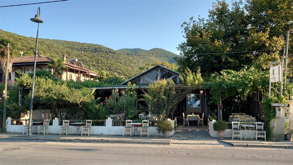 The restaurant entrance with the mountain behind